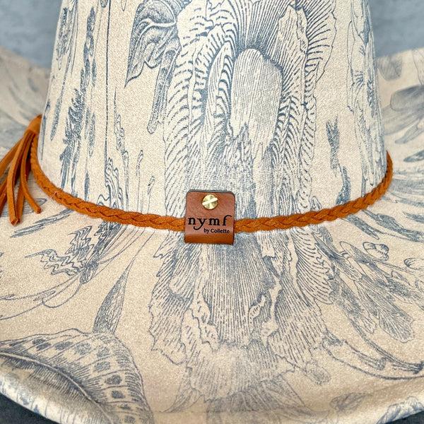 611fc05e3c4ce80992caae23_blue-chinoiserie-off-white-cowboy-back_1759162829639.jpg