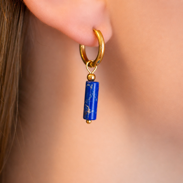 611fc05e3c4ce80992caae23_blue-stone-charm-dangle-huggies-model_1791496606769.png