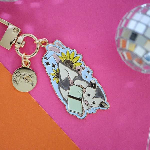 611fc05e3c4ce80992caae23_book-opossum-keychain-5_1790815933951.jpg