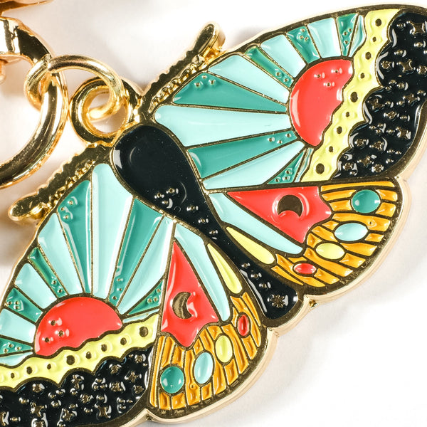 611fc05e3c4ce80992caae23_cosmic-moth-keychain-1_1790897078432.jpg