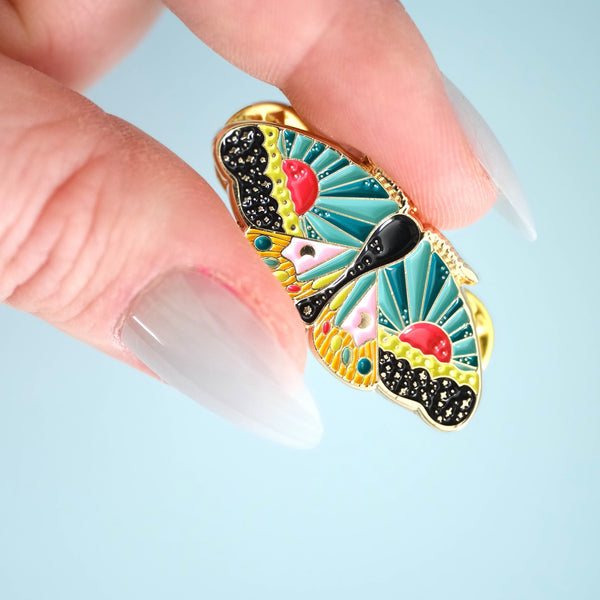 611fc05e3c4ce80992caae23_cosmic-moth-pin_1790866060044.jpg