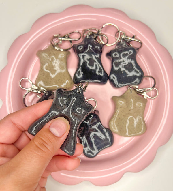 611fc05e3c4ce80992caae23_curvy-worry-stones-in-hand_1790628082677.jpg