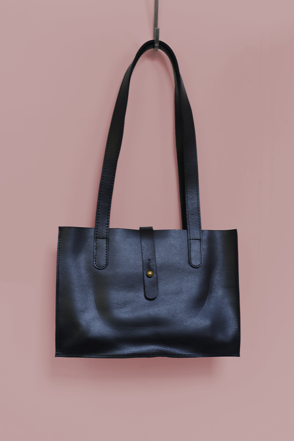 611fc05e3c4ce80992caae23_midsized-convertible-handbag-in-black-front_1785430633505.png