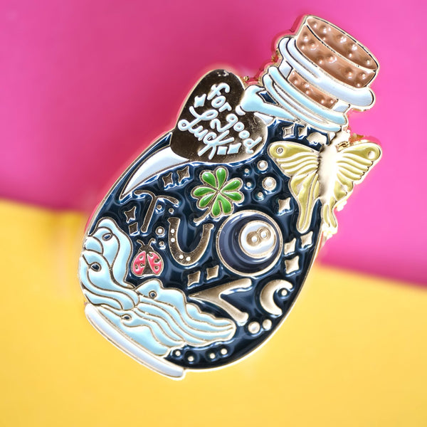 611fc05e3c4ce80992caae23_or-good-luck-bottle-pin-2_1790866475165.jpg