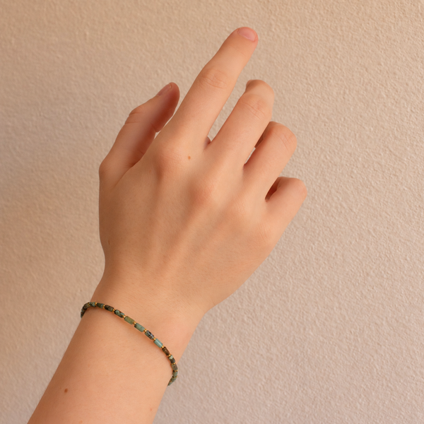 611fc05e3c4ce80992caae23_soft-green-beaded-bracelet-model_1791500556537.png