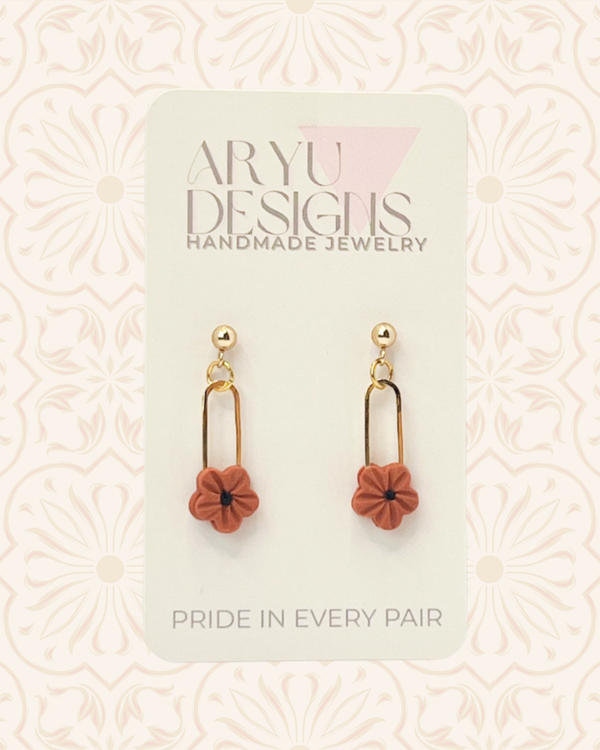 611fc05e3c4ce80992caae23_updated-bloom-clip-dangles-nectarine-on-card_1790709035019.png