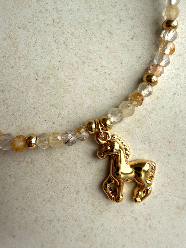 611fc05e3c4ce80992caae23_year-of-the-horse-bracelet-topaz-06_1771023012235.jpg